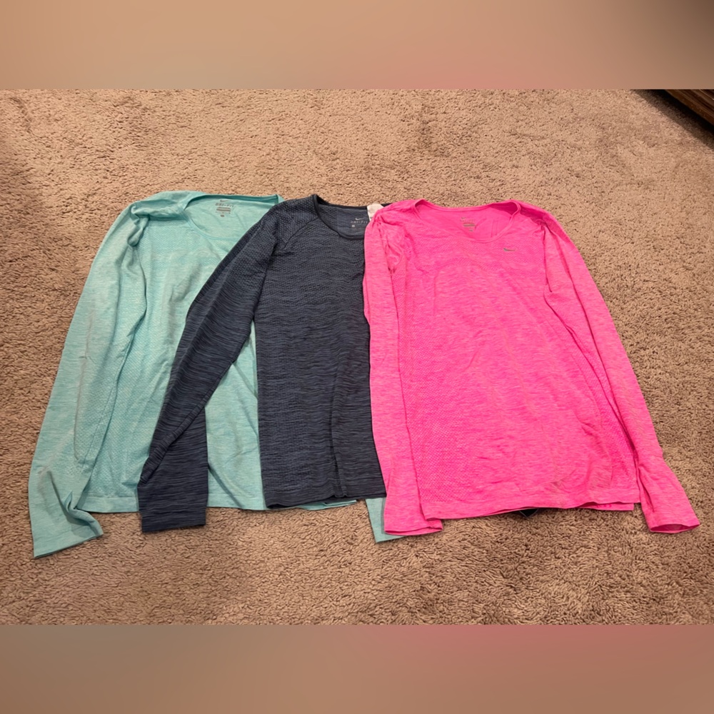 3 Women’s Large Nike Dri-FIT Shirts
